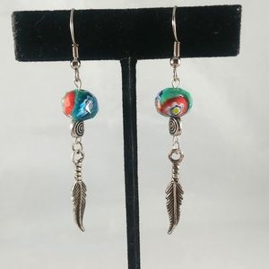 Kaleidoscope Style beaded earrings feather accent